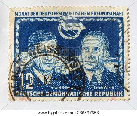 Leeds, England - April 18 2018: An Old Blue East German Postage Stamp With An Image Celebrating Germ