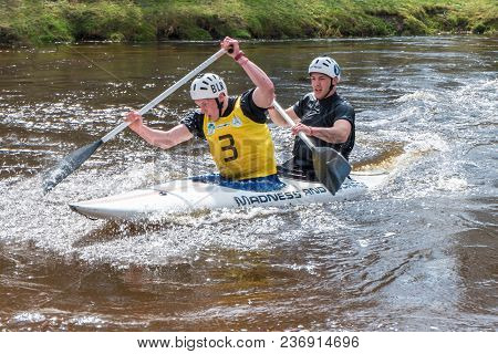 Grodno, Belarus - April, 2018: Kayak Freestyle Competition On Fast Cold Water River Strenuously Rowi