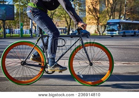 Cyclist In The City. Bicycle Close-up. Eco-friendly Mode Of Transport