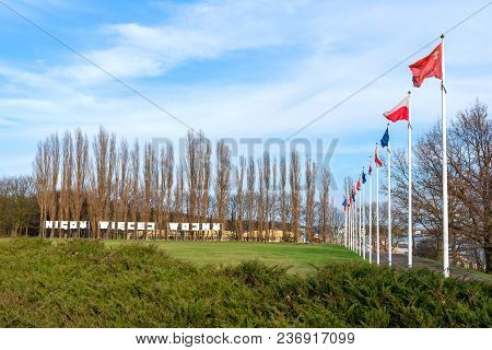 Gdansk Westerplatte, Poland - April 15, 2018: Masts With Flags And Inscription War Never Again (poli