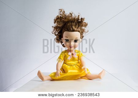 Used Pretty Doll With Messed Up Hair In Pretty Dress Again White Backdrop, Legs Wide Open.