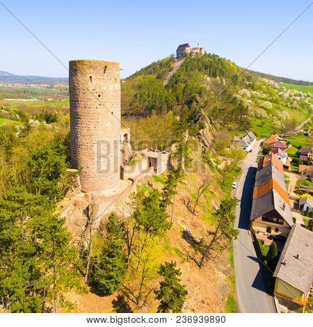 Aerial view of Zebrak Castle. A ruin of a Gothic castle originated in the 13th century. Since 1336 a royal castle, enlarged by Kings Charles IV. Czech famous monument from above.