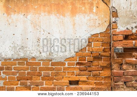 Retro Old Weathered Brick Wall Fragment Textuer Background Or Destroyed Concrete Decayed By Time.