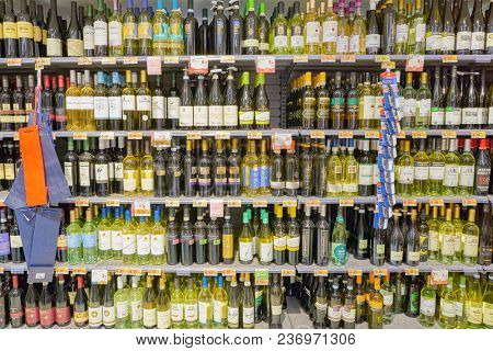 ROME, ITALY - CIRCA NOVEMBER 2017: bottles of wine on display in Conad supermarket in Rome.