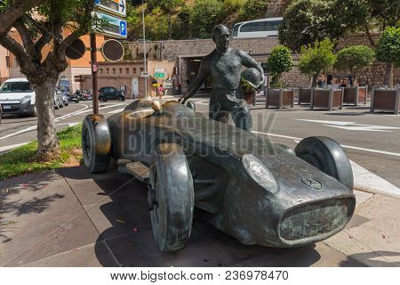 Kingdom Monaco - August 08, 2017: A sculpture of race car and driver Juan Manuel Fangio.