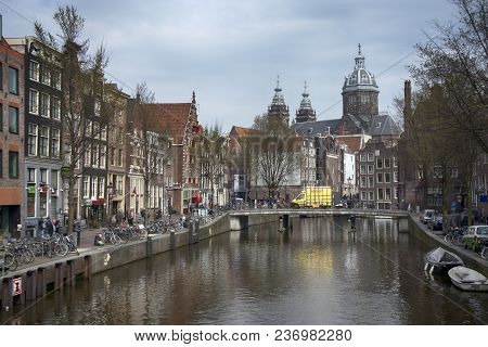 Amsterdam, Holland - 14 April 2018 Basilica Of St. Nicholas On The Prins Hendrikkade Street. It Is T