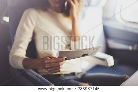 Enjoying Business Travel Concept. Young Beautiful Brunette Tourist Girl Travelling On The Train Sitt