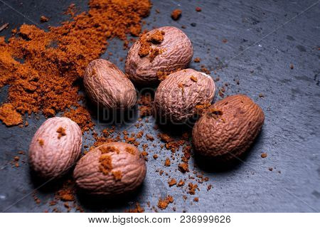 Nutmeg On Dark Background, Directly Above, Copy Space