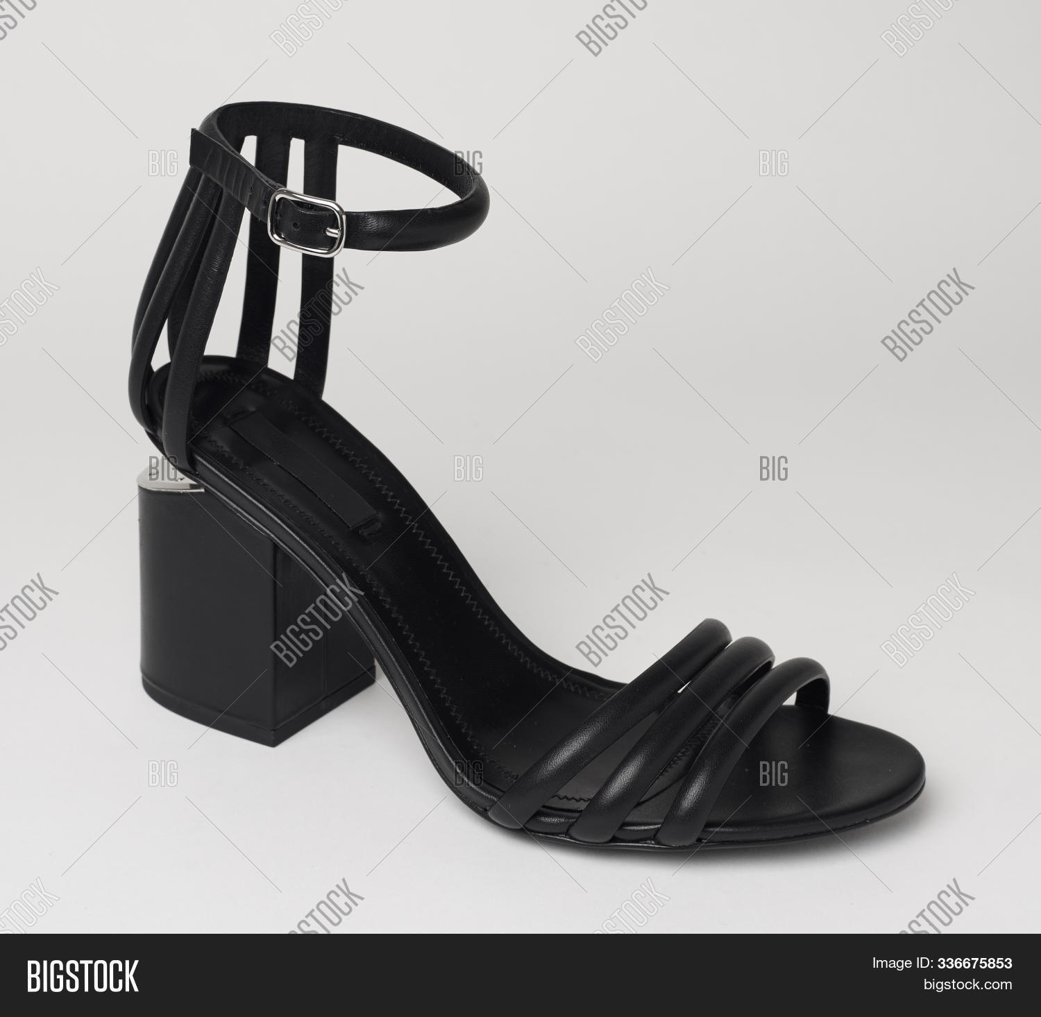 black heels with roses on them