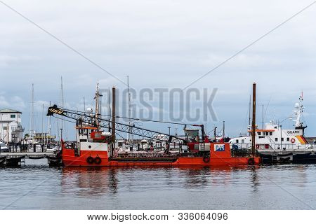 Sassnitz, Germany - August 1, 2019: Red Dredge Ship Moored In The Harbour. Sassnitz Is A Small Town 