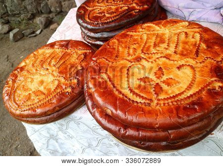 Stack Of Freshly Made Gata, Traditional Armenian Sweet Breads For Sale At Geghard Monastery, Armenia