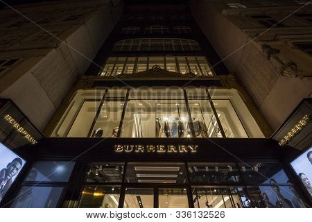 Vienna, Austria - November 6, 2019: Burberry Logo On Their Boutique For Vienna, At Night. Burberry I