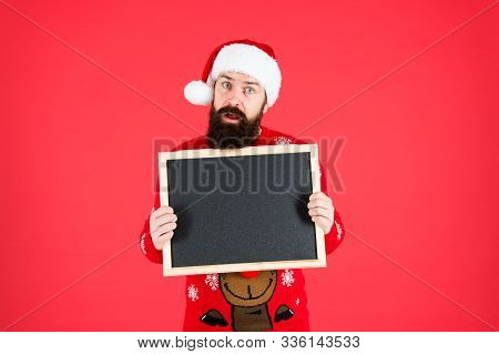 New Year And Christmas Publicity. Bearded Man Hold Blank Publicity Board. Santa Claus Display School