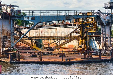 St.petersburg, Russia - July 23, 2019 - Heavy Machinery On Floating Reapir Station On Neva River, Ol