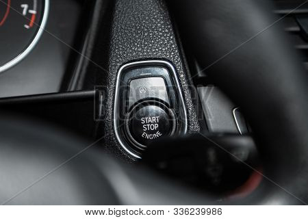 Novosibirsk, Russia - October 10, 2019:  Bmw 1 Series 118i, Car Engine Push Start Stop Button Igniti