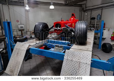 Novosibirsk, Russia - 11.01.2019: The Process Of Repairing And Restoring A Red Ferrari Formula 1 Car