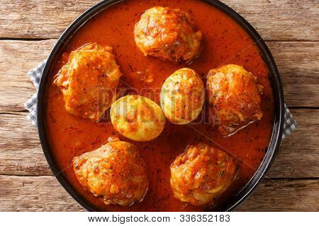 Doro Wat Is Ethiopian Stew Of Chicken Thighs With Eggs In A Spicy Sauce Close-up In A Plate. Horizon