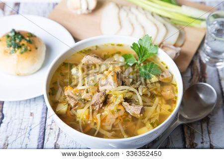 Shchi (cabbage Soup) With Buns (pampushki), Fat And Garlic. Traditional Russian And Ukrainian Soup. 