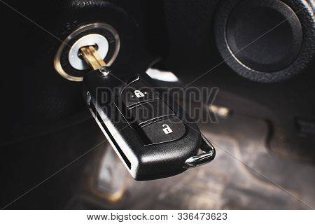 Car Keyless Remote On A Keyhole In A Car.