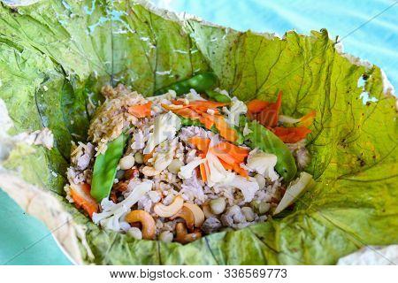 Myanmar Food Specialty - The Rice Dish With Vegetable And Nuts Ingredients Wrapped In Lotus Leaf, So
