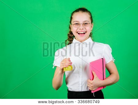 Science Research In Lab. Small School Girl. Education And Knowledge. Small Smart Girl With Testing F