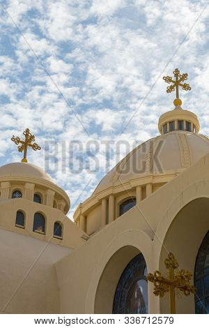 Coptic Orthodox Church In Sharm El Sheikh, Egypt.against The Backdrop Of A Beautiful Sky With Clouds
