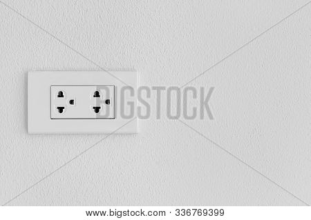 Electrical Outlet On Wall Loft Style,
Power Plug On White Concrete Wall, Energy Socket.