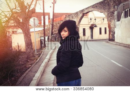 Brunette Woman Traveling In The Town In Georgia