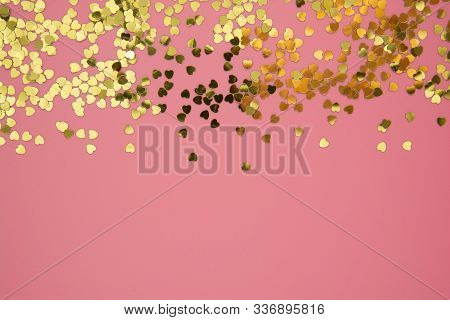 Abstract Textured Backgraund, Golden Heart Shape Glitter Over Pink Background. Valentine's Day, Love