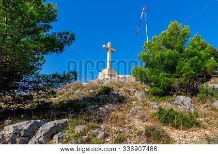 Stone Cross Monument On Mount Srd. Dubrovnik. Croatia.