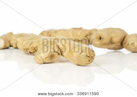 Group Of Two Whole Fresh Brown Ginger Isolated On White Background