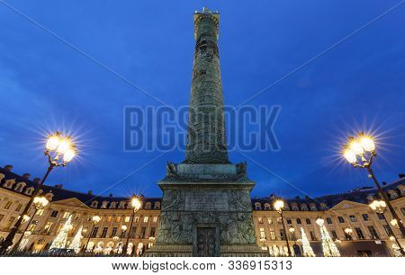Vendome Column With Statue Of Napoleon Bonaparte, On The Place Vendome At Night, Paris, France.
