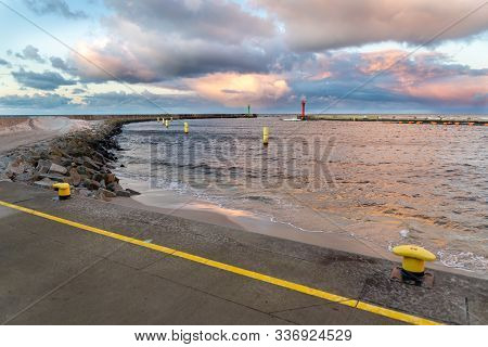 Mrzezyno, Zachodniopomorskie / Poland – November, 30, 2019 :. Breakwater In The Baltic Port. Rough S