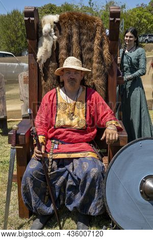 Eungella, Queensland, Australia - October 2021: Man In Replica Viking Costume Seating In A Fur Lined