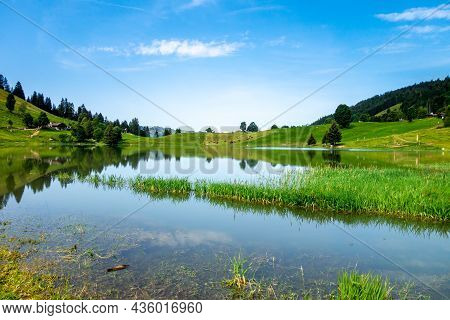 Lake Of The Confins And Mountain Landscape In La Clusaz, Haute-savoie, France
