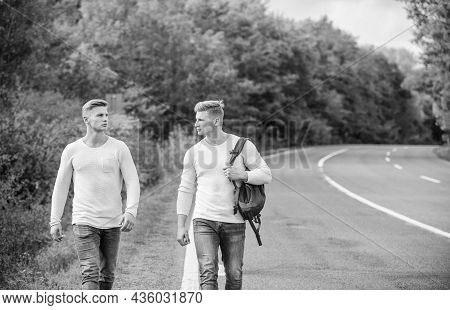 Type Of Travel. Men Hitch Hiking. Man Casual Style Travel With Backpack. Traveler Hitchhiking On Hig