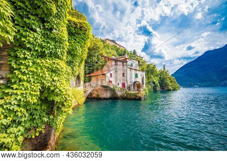 Town Of Nesso Historic Stone Bridge And Scenic Lakefront View, Como Lake, Lombardy Region Of Italy