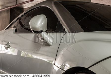 Bangkok, Thailand - 31 Aug 2021 : Side View Of Car Headlights Of White Peugeot Rcz Sports Car Parked