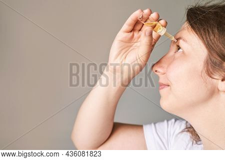 Young Woman Doing Morning Routine. Home Maternity Treatment. Health Care Concept. Female Person. Eye