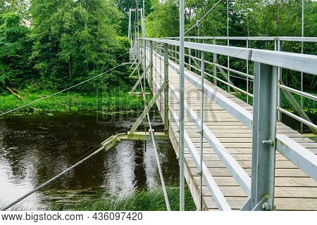 New Suspension Bridge Made Of Wood And Steel Over The Small River