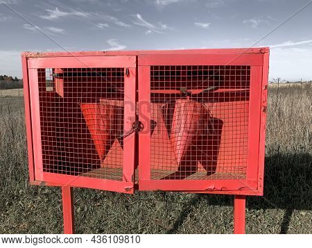 Two Red Fire Buckets, Pails On A Firifighting Shield, Prevention And Extingushing Fire.