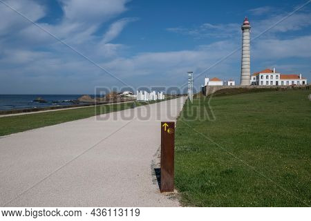 View of the promenade of Leca da Palmeira, Direction indicator Camino de Santiago, the Portuguese Coastal Way, Porto, Portugal. 