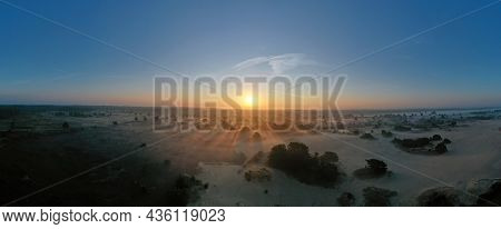 Aerial panorama from the forest Drents Friese Woud in the Netherlands at sunrise