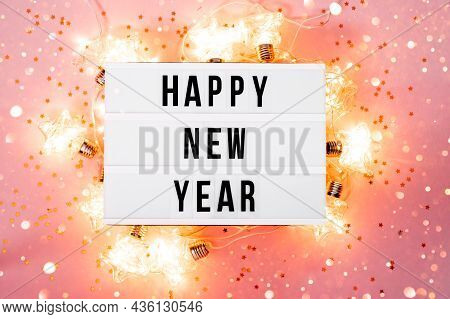 Happy New Year 2022 Lletter Board Light Box With Christmas Decorations And Garland Sparkling Lights.
