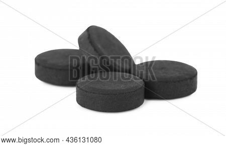 Activated Charcoal Pills On White Background. Potent Sorbent