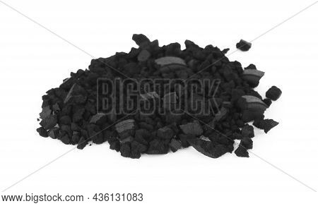 Pile Of Crushed Activated Charcoal Pills On White Background. Potent Sorbent