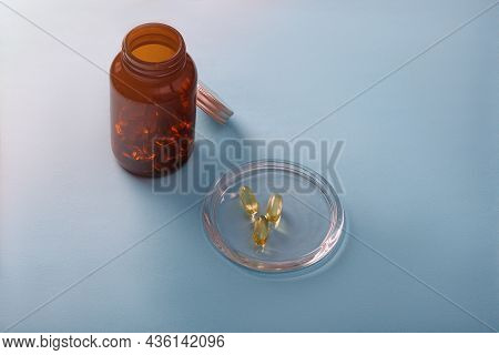 Cod Liver Oil Capsule ,fish Oil ,food Supliment With Omega 3 ,heart Care .  Top View.