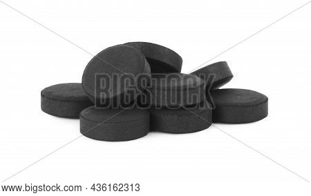 Activated Charcoal Pills On White Background. Potent Sorbent