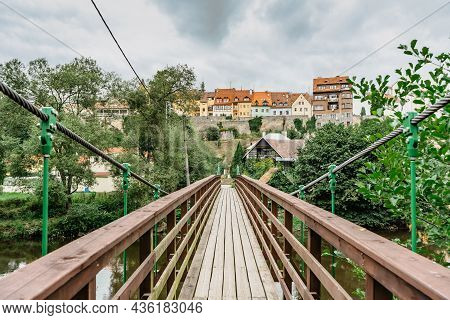 Pedestrian Bridge Over Ohre River In Famous Medieval Town Of Loket,elbogen, With Colorful Houses And