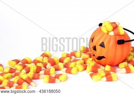 Mini Orange Jack-o-lantern With Halloween Candy Corn